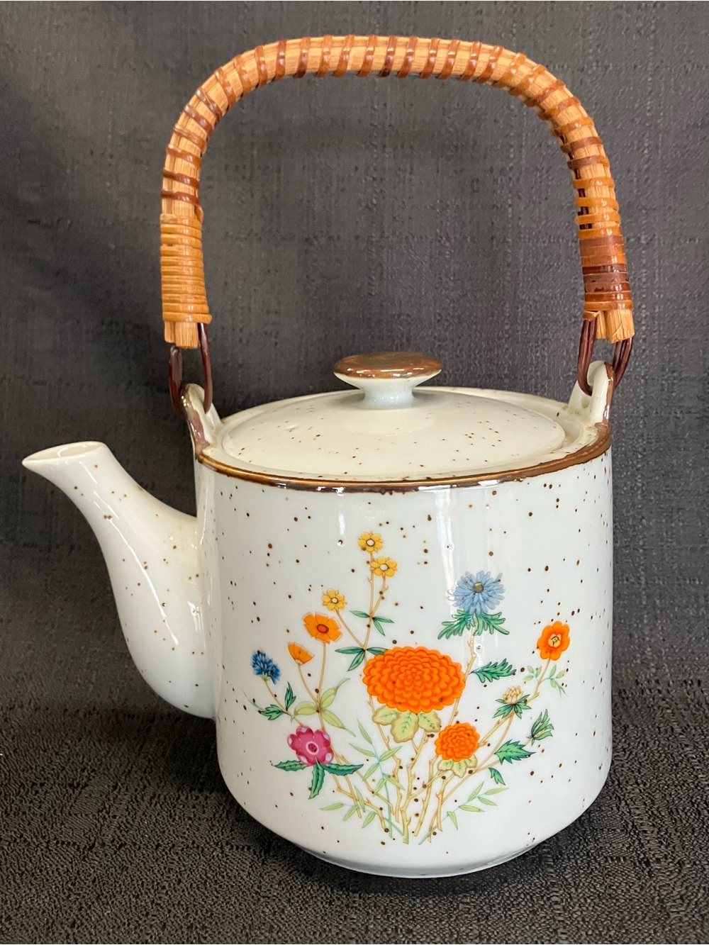 Vintage Japanese-style Ceramic Floral Speckled Teapot with Rattan Handle
